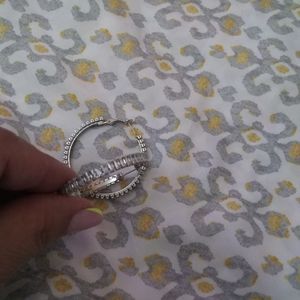 Brand new no tag . Sterling silver hoop style earring.